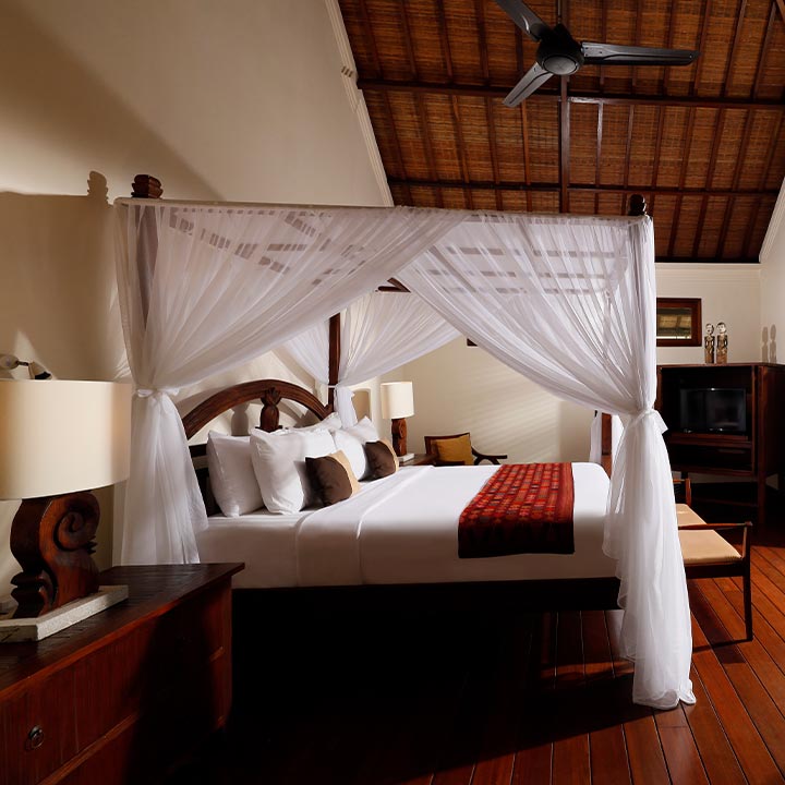 Villa Shanti Jimbaran - master bedroom with mosquito net and flat tv